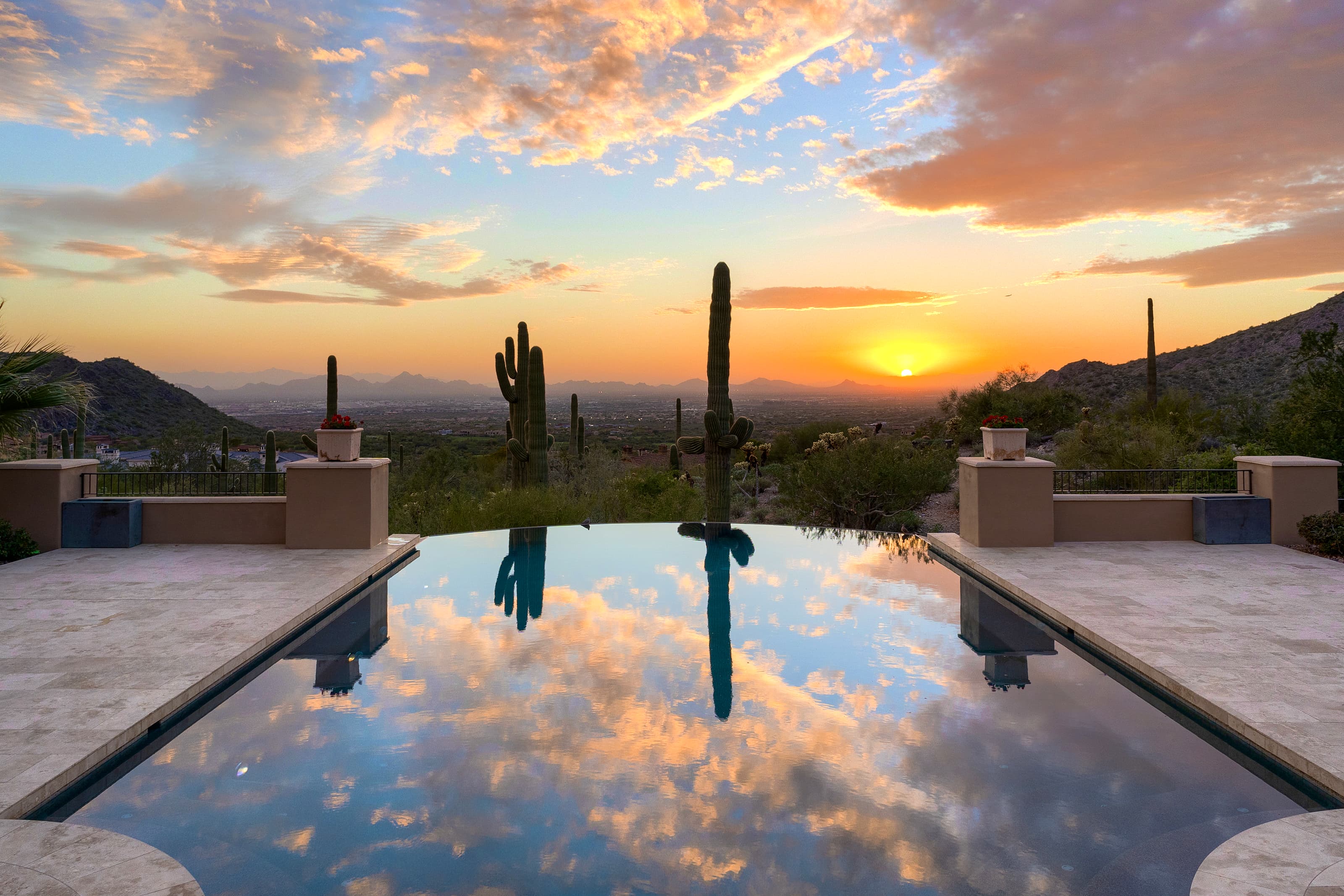 Infinity pool with panoramic Arizona sunset view — Scottsdale luxury real estate